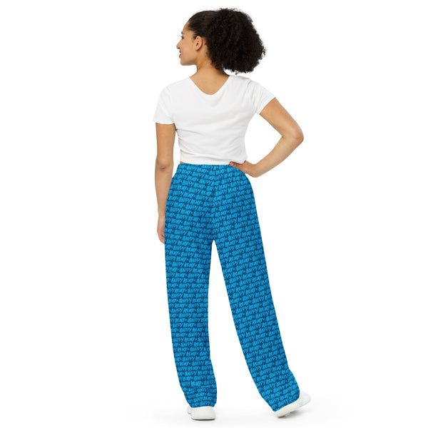 Model wearing AOH Lounge Pants with all-over logo print